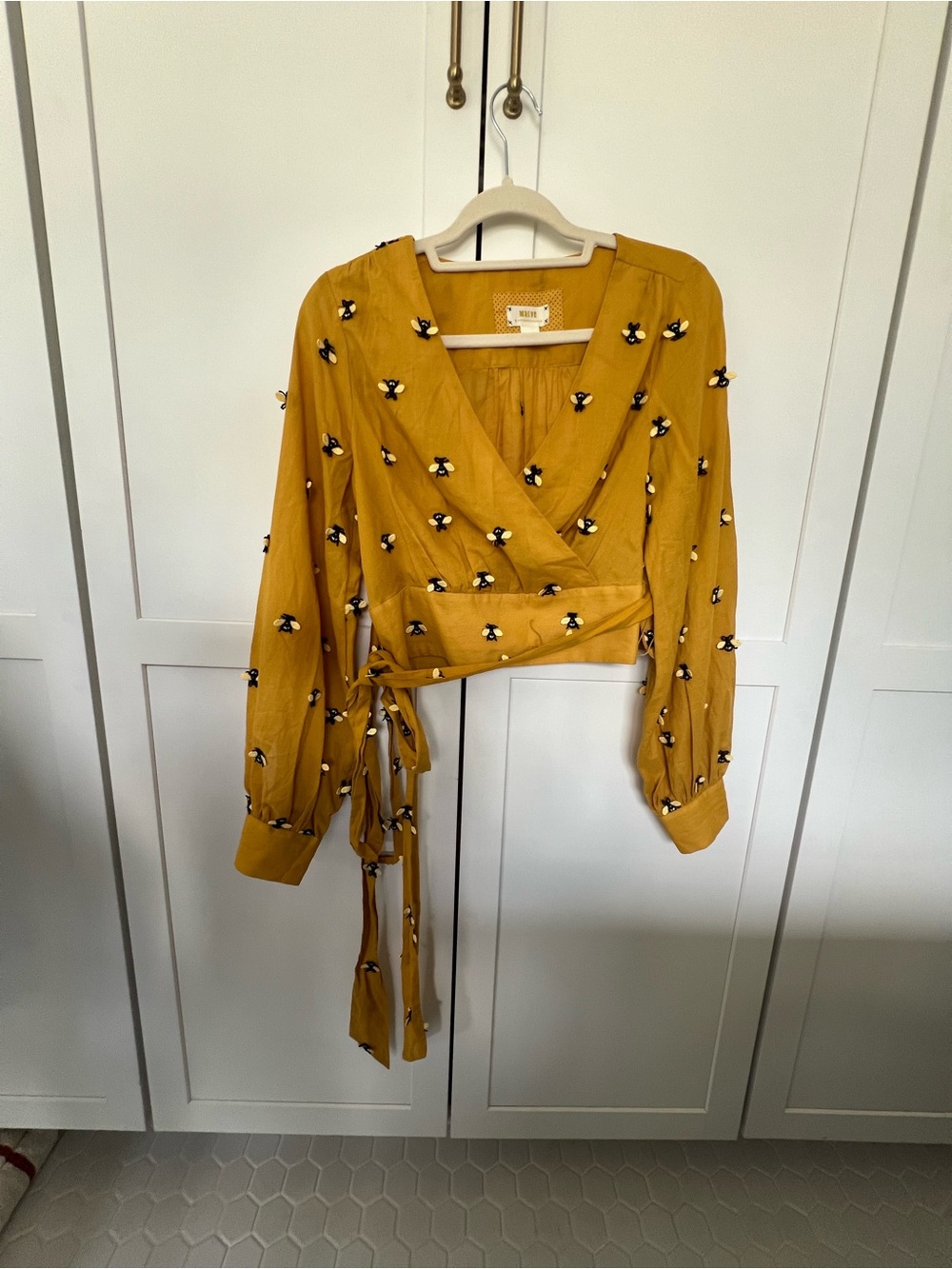 Maeve Faux Wrap Top with Bee Embellishment